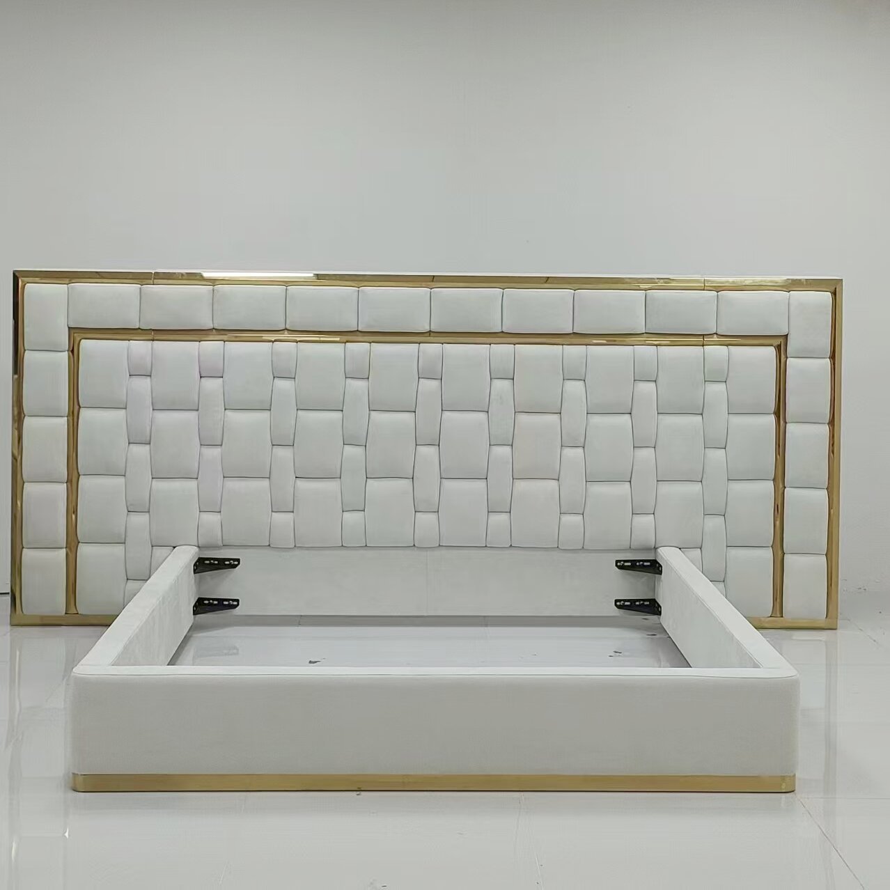 White Upholstered Bed with Gold Accent for Refined Bedroom Spaces