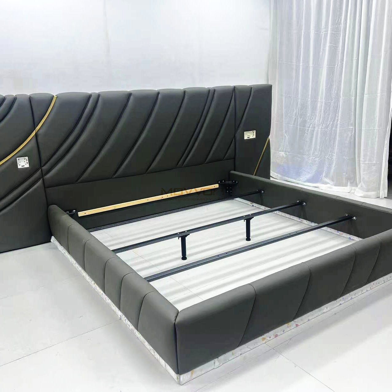 Curved Channel Upholstered Bed with Gold Accent Bedroom Design