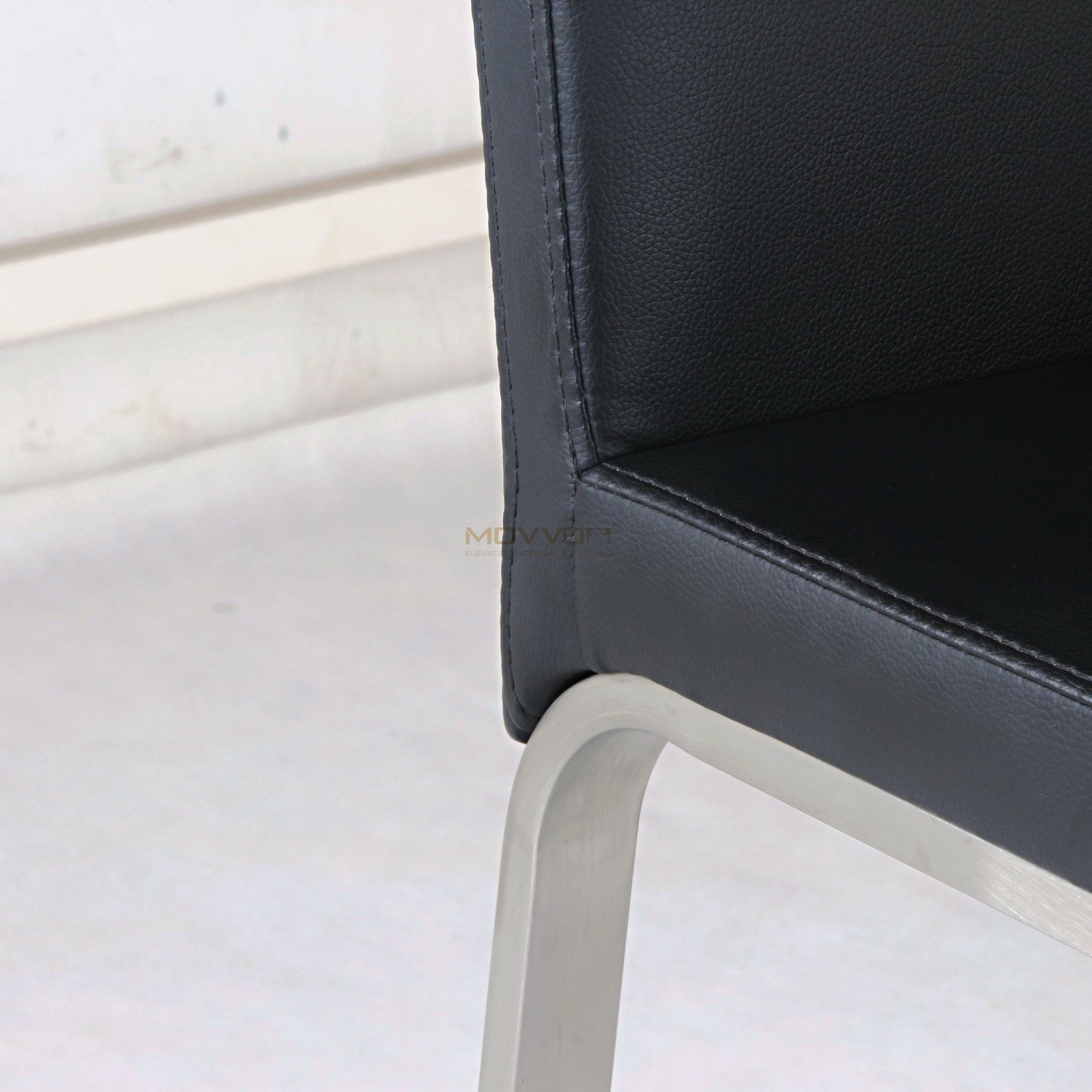 Black Upholstered Bar Chair with Arched Metal Footrest
