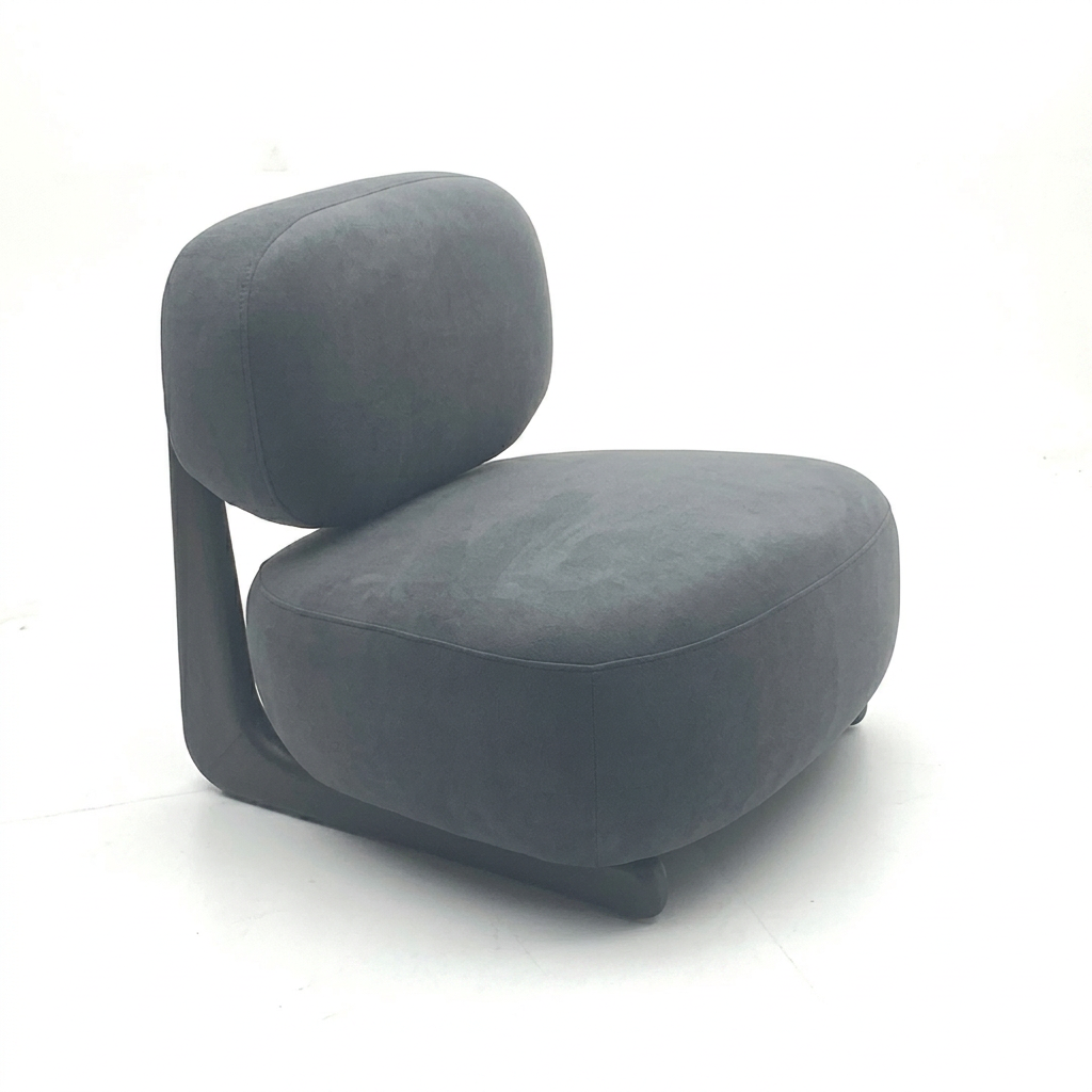 Graphite Armless Lounge Chair Built as a Soft Low Block