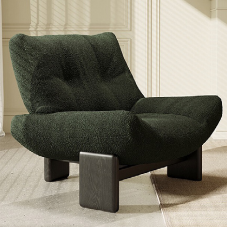 Deep Green Textured Lounge Chair Resting on Black Wood Block Legs