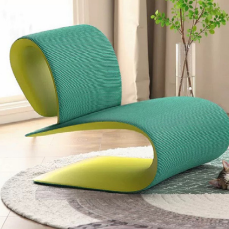 Teal Ribbon Lounge Chair Formed as a Continuous Cantilever Curve