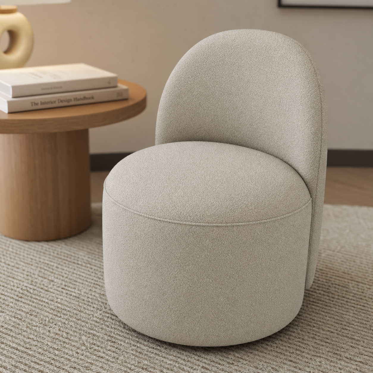 Cream Boucle Barrel Chair with an Arched Back Silhouette